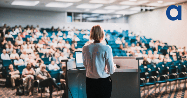 Female speaker giving a talk on corporate business conference