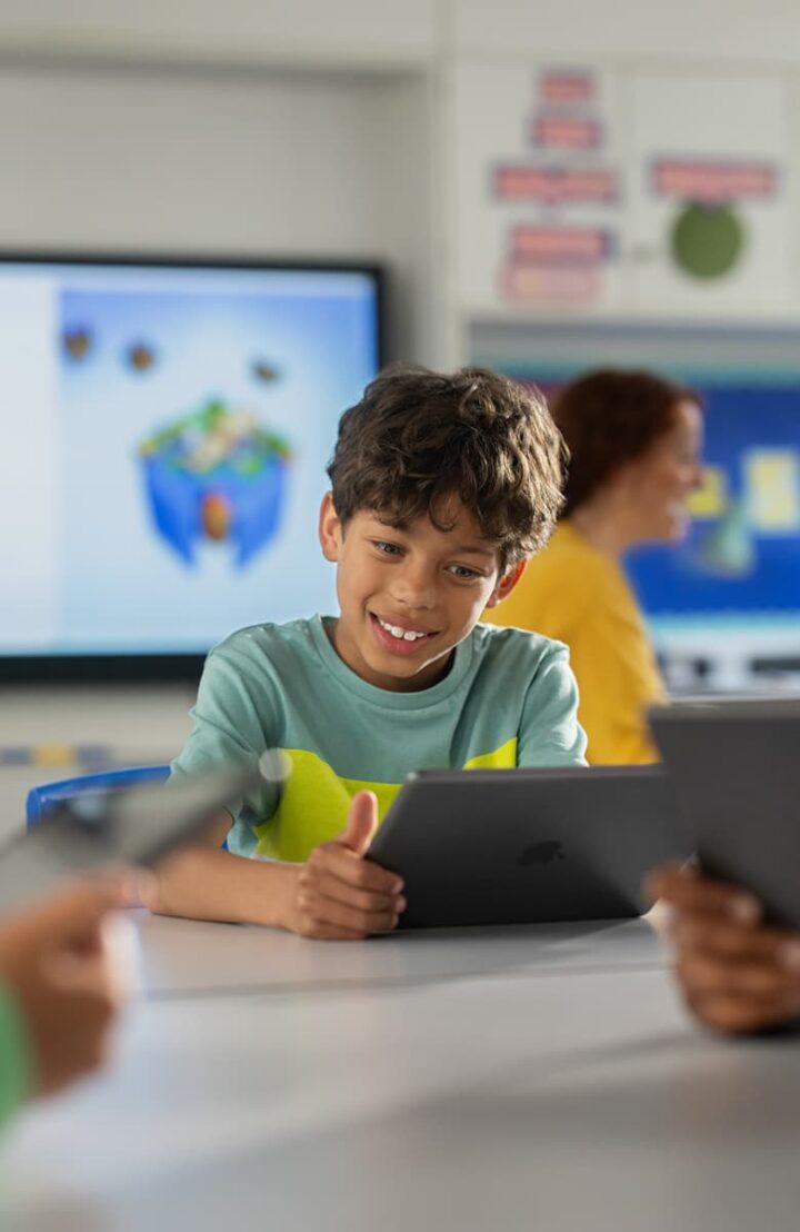 kid learning on apple device